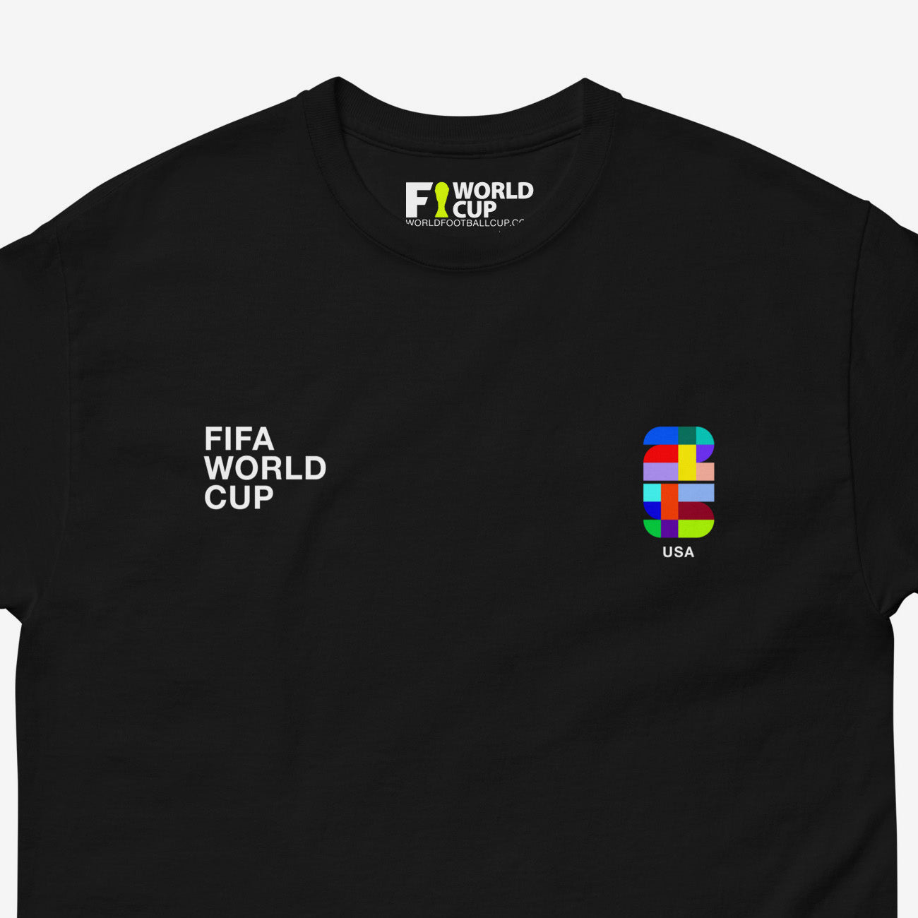 FIFA 2025 branded black tee with '25' logo 'FIFA World Cup' text – From worldfootballcup.com. Closeup photo.